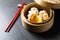 è‚‰ã¾ã‚“. steamed Creamy Custard Bun. Chinese Traditional cuisine concept. Dumplings Dim Sum in bamboo steamer with text copy